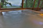 Relax any time of day in the terrace level hot tub